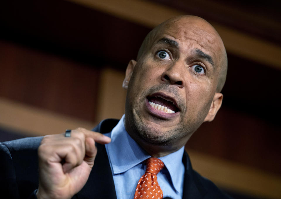 FILE - In this July 14, 2021, file photo Sen. Cory Booker, D-N.J., speaks to reporters after announcing a draft bill that would decriminalize marijuana on a federal level on Capitol Hill in Washington. A leading Democratic senator says bipartisan congressional talks on overhauling policing practices have ended without agreement. Booker has told reporters that bargainers were not making progress on issues like whether to hold individual officers personally liable for abusive behavior. (AP Photo/Amanda Andrade-Rhoades, File)