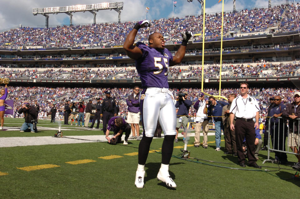 Defensive end Terrell Suggs #55 of the Baltimore Ravens pumps up the crowd against the Cleveland Browns at M&T Bank Stadium on October 16, 2005 in Baltimore, Maryland. The Ravens defeated the Browns 16-3. (Photo by Larry French/Getty Images)