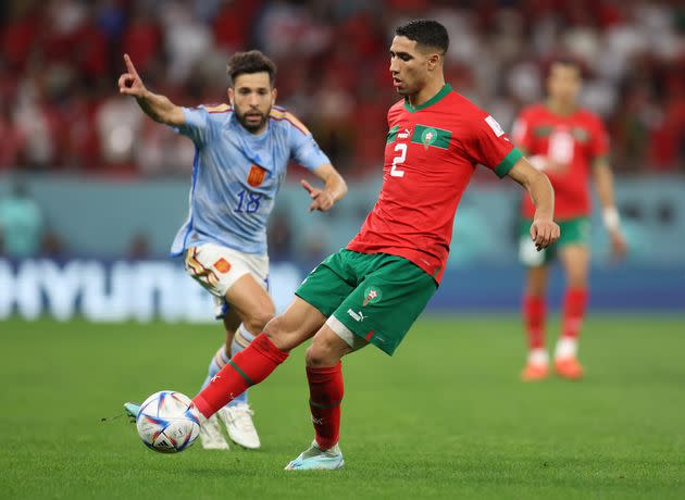Achraf Hakimi of Morocco (front) during the FIFA World Cup Qatar 2022 Round of 16 match between Morocco and Spain at Education City Stadium on Dec. 6 in Al Rayyan, Qatar.