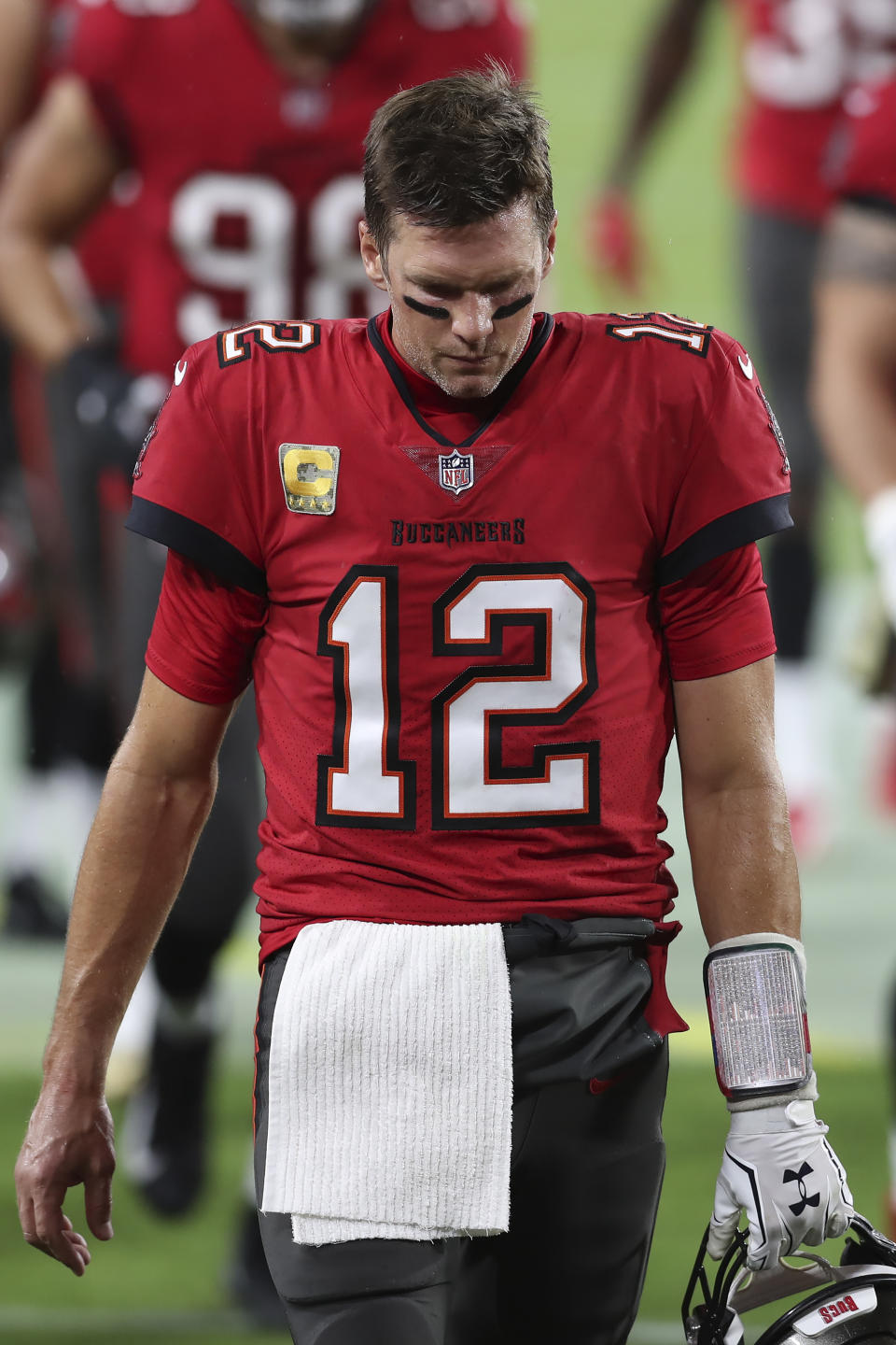 Tampa Bay Buccaneers quarterback Tom Brady (12) reacts as he leaves the field at the end of the first half of an NFL football game against the New Orleans Saints Sunday, Nov. 8, 2020, in Tampa, Fla. (AP Photo/Mark LoMoglio)