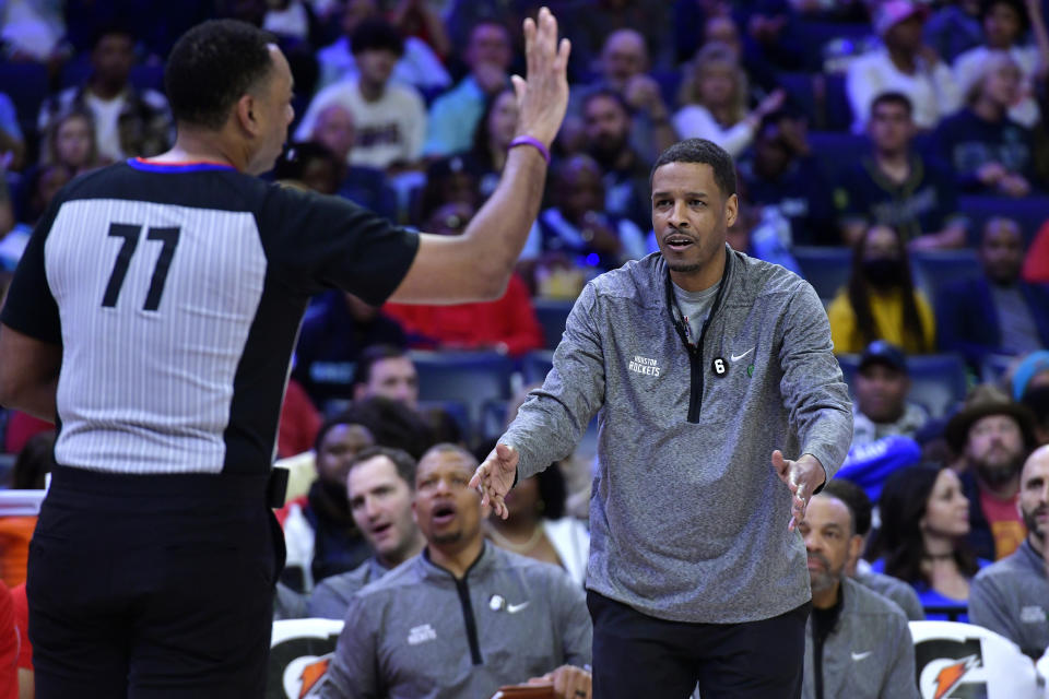Houston Rockets coach Stephen Silas, right, reacts to a referee's call during the first half of the team's NBA basketball game against the Memphis Grizzlies on Friday, March 24, 2023, in Memphis, Tenn. (AP Photo/Brandon Dill)