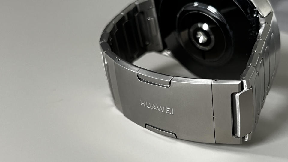 The Huawei Watch 4 Pro on a grey background