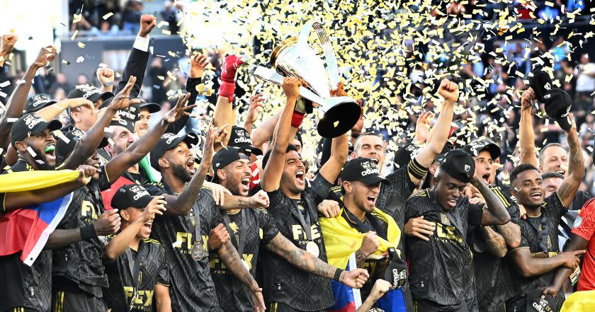 Los Angeles, California November 5, 2022-LAFC players celebrate the MLS Cup after defeating Union at Bank of California Saturday. (Wally Skalij/Los Angeles Times)