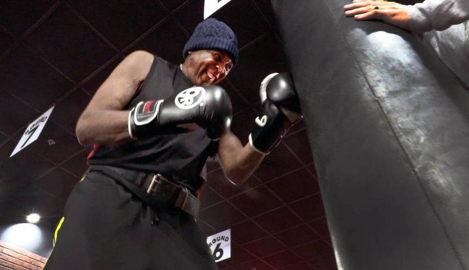 Clarence Cunningham, a resident at the Thrive at Green Island senior living community, works out recently at 9Round Fitness in Columbus. The workout was made possible through the Dream Weaver program at Thrive at Green Island. 03/11/2022