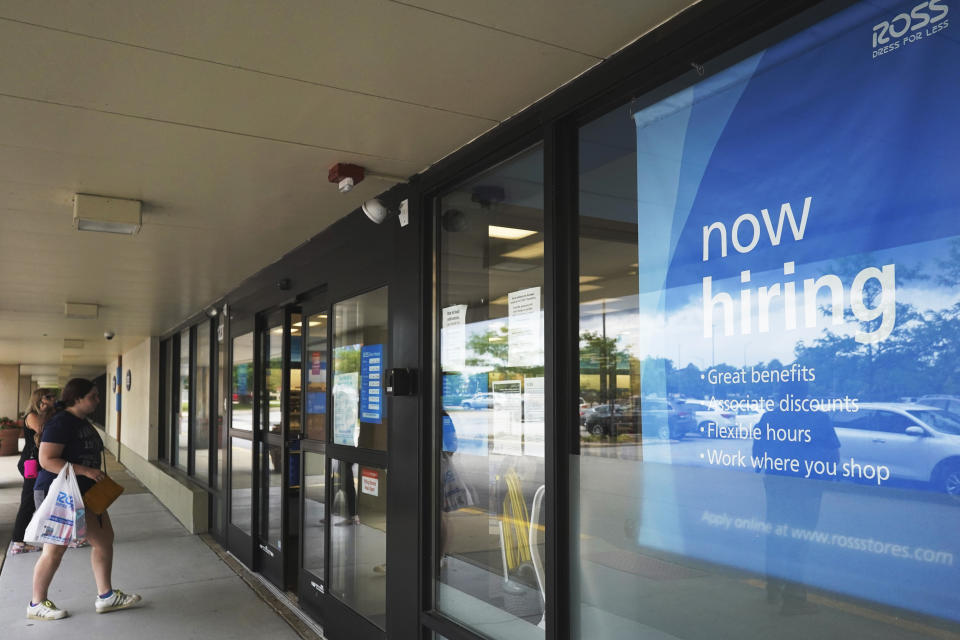 A hiring sign is displayed at a retail store in Schaumburg, Ill., Thursday, July 15, 2021. The number of Americans applying for unemployment benefits has reached its lowest level since the pandemic struck last year, further evidence that the U.S. economy and job market are quickly rebounding from the pandemic recession. Thursday's report from the Labor Department showed that jobless claims fell by 26,000 last week to 360,000.(AP Photo/Nam Y. Huh)