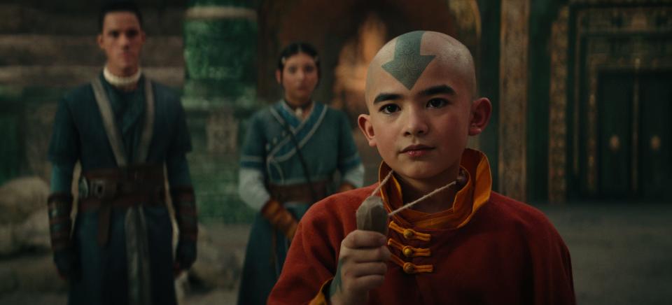 Ian Ousley as Sokka, Kiawentiio as Katara and Gordon Cormier as Ang in season 1 of Netflix's Avatar: The Last Airbender.