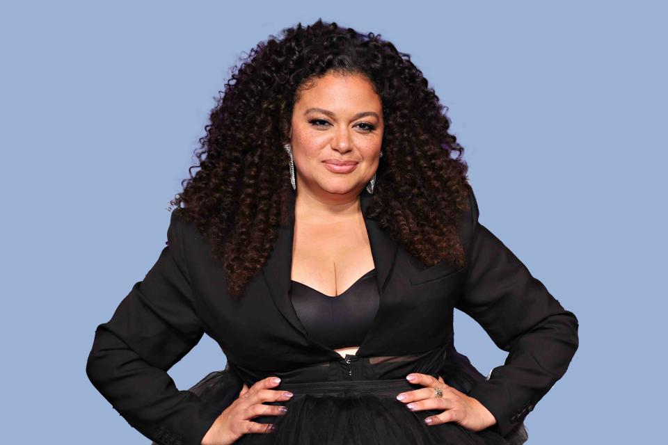 <p>John Nacion/Getty Images</p> Photo of Michelle Buteau wearing all black.