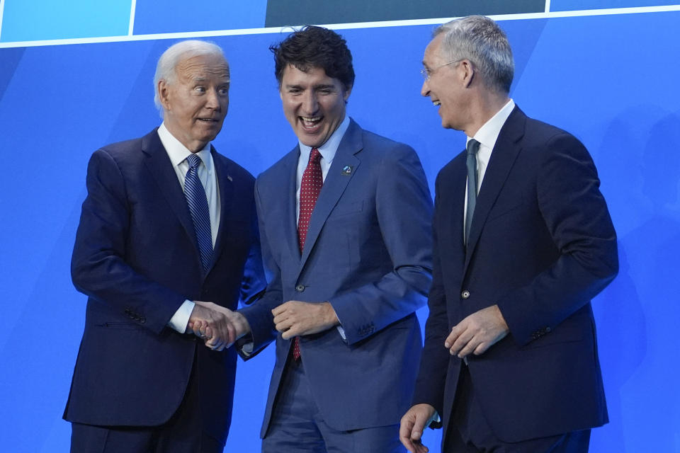 President Joe Biden and NATO Secretary General Jens Stoltenberg, right, welcome Canada's Prime Minister Justin Trudeau to the NATO Summit, Wednesday, July 10, 2024, in Washington. (AP Photo/Evan Vucci)