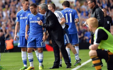 Jose Mourinho passes instructions to Eden Hazard - Credit: getty images