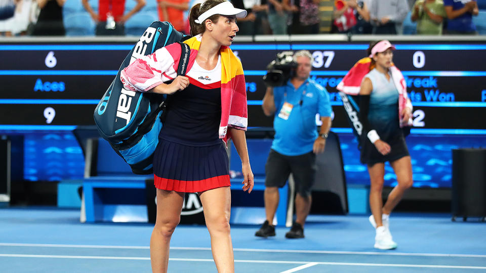 Johanna Konta walks off court after her loss to Garbine Muguruza. (Photo by Julian Finney/Getty Images)