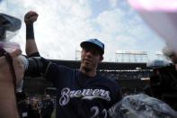 Oct 1, 2018; Chicago, IL, USA; Milwaukee Brewers center fielder Christian Yelich (22) celebrates after defeating the Chicago Cubs in the National League Central division tiebreaker game at Wrigley Field. Mandatory Credit: Patrick Gorski-USA TODAY Sports