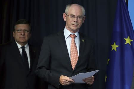 European Council President Herman Van Rompuy and European Commission President Jose Manuel Barroso (L) arrive at a joint news conference after an European Union leaders summit in Brussels early July 17, 2014. REUTERS/Francois Lenoir