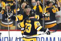 Pittsburgh Penguins' Jeff Carter (77) celebrates his goal during the second period in Game 4 of an NHL hockey Stanley Cup first-round playoff series against the New York Rangers in Pittsburgh, Monday, May 9, 2022. (AP Photo/Gene J. Puskar)