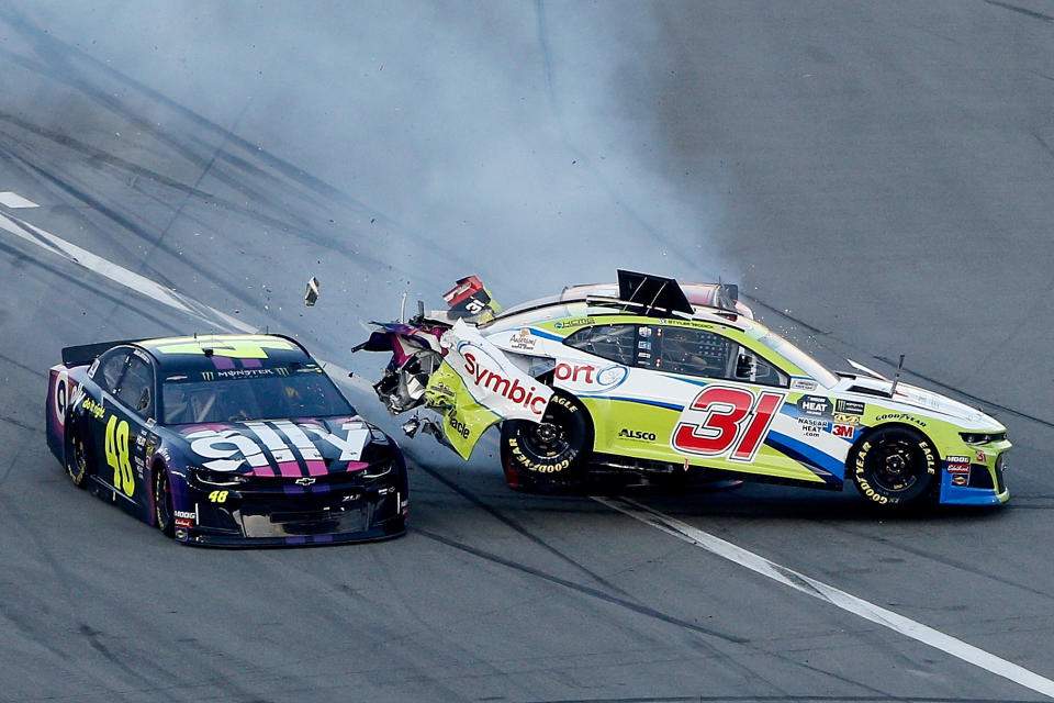 This happened as Jimmie Johnson and Tyler Redick were trying to pit. (Photo by Brian Lawdermilk/Getty Images)