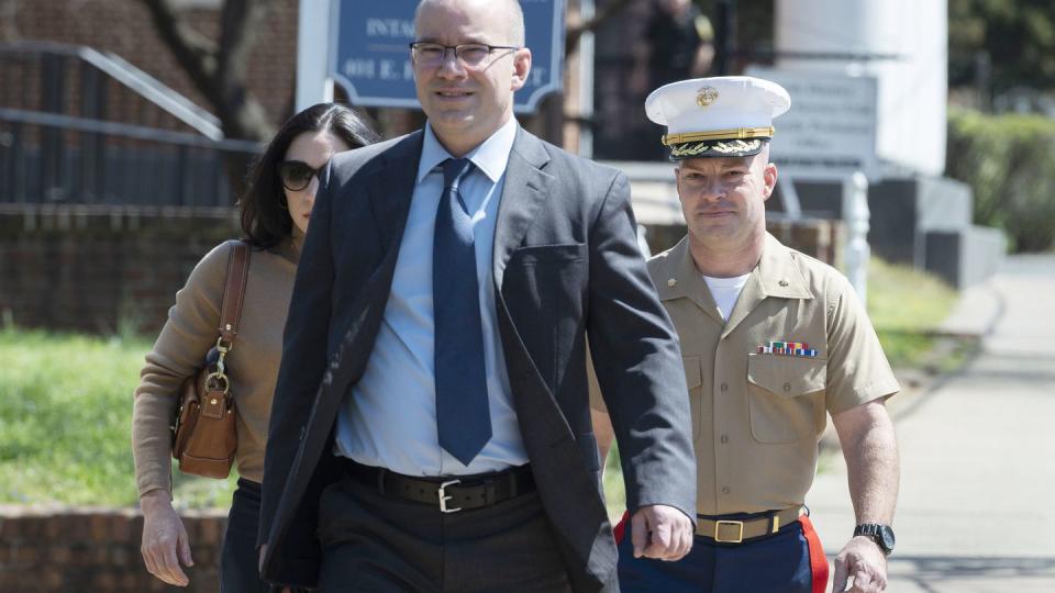 Marine Maj. Joshua Mast and his wife, Stephanie, arrive at Circuit Court, with his attorney and brother, Richard Mast, Thursday, March 30, 2023 in Charlottesville, Va. (Cliff Owen/AP)