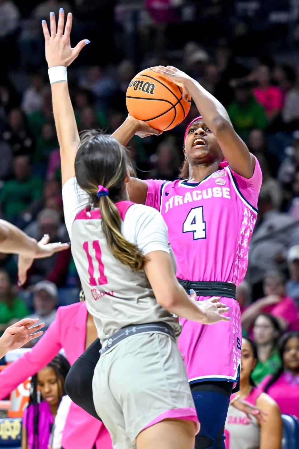 Syracuse guard Teisha Hyman, who has signed to play for the URI Rams next season, shoots over Notre Dame guard Sonia Citron during a game in February in South Bend, Ind.