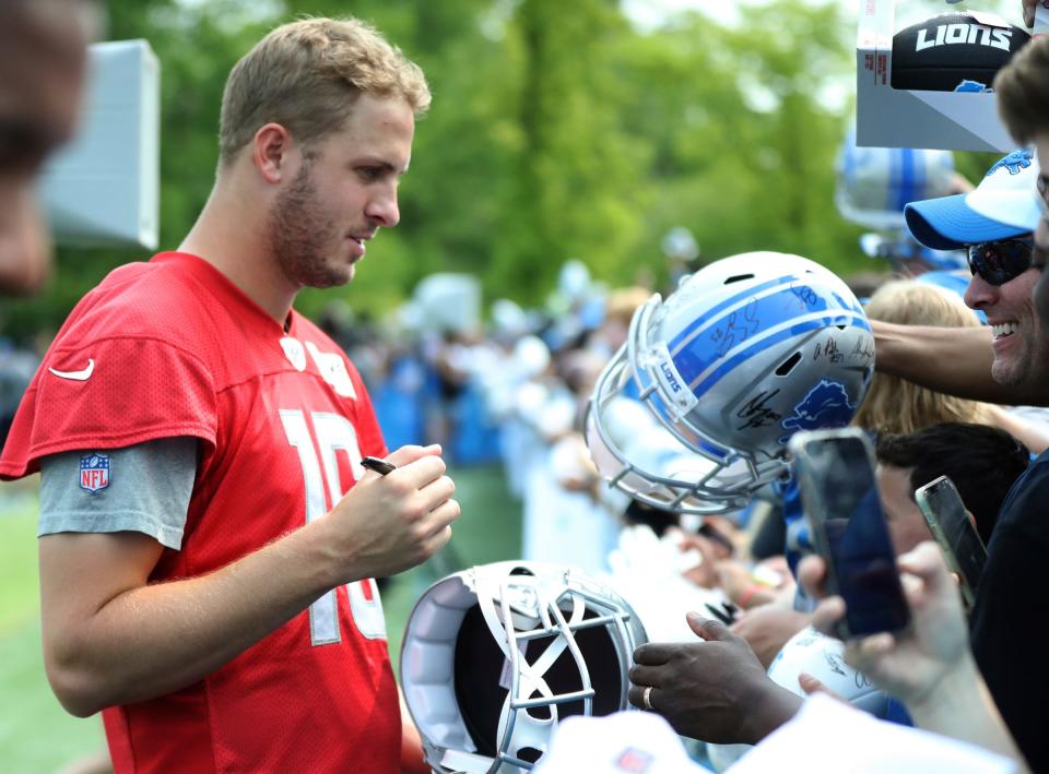 Lions quarterback Jared Goff signs autographs at the end of training camp on Wednesday, Aug. 02, 2023, in Allen Park.