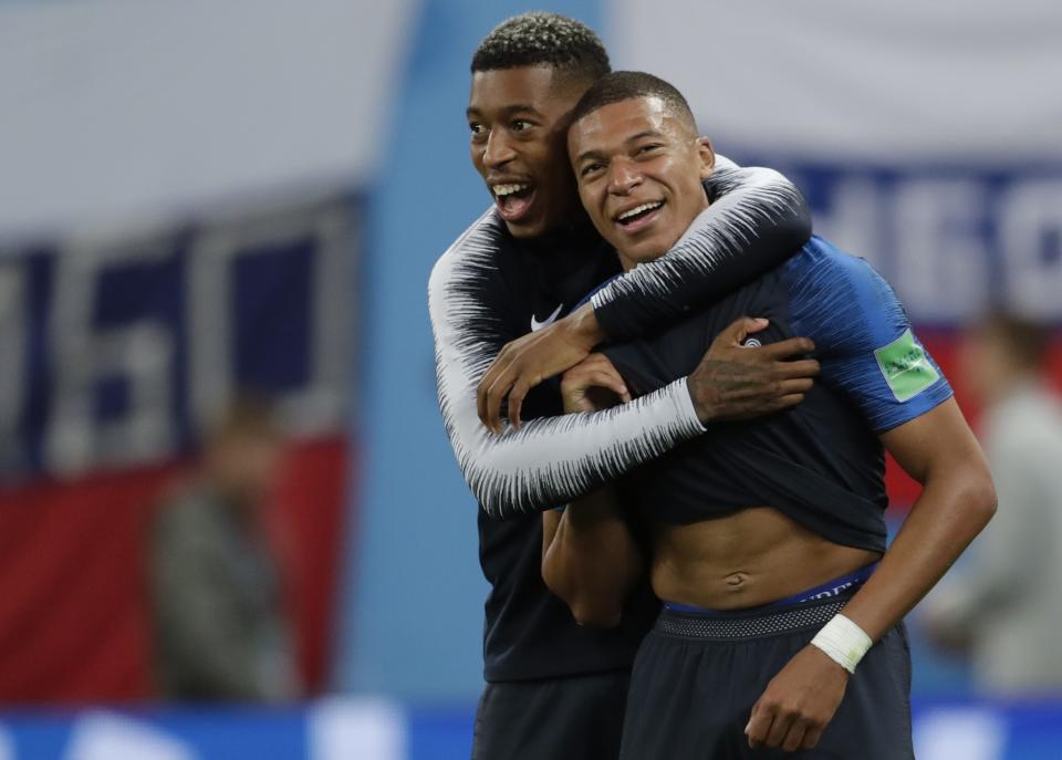 France’s Kylian Mbappe, right, and Presnel Kimpembe celebrate at the end of the semifinal match between against Belgium. (AP Photo/Petr David Josek)