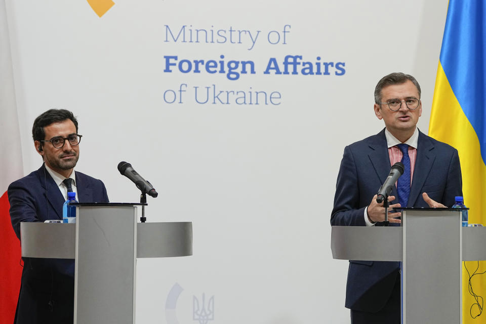 Ukraine's Foreign Minister Dmytro Kuleba, right, and his French counterpart Stephane Sejourne attend a joint press conference in Kyiv, Ukraine, Saturday, Jan. 13, 2024. (AP Photo/Efrem Lukatsky)