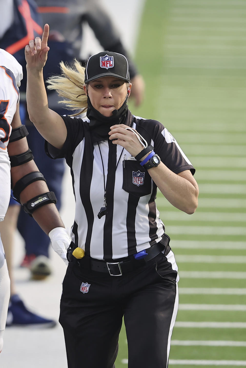 FILE - Line judge Sarah Thomas (53) officiates during an NFL football game between the Denver Broncos and the Los Angeles Chargers in Inglewood, Calif., in this Sunday, Dec. 27, 2020, file photo. Sarah Thomas will cap her sixth NFL season by becoming the first female to officiate the Super Bowl in NFL history. Thomas, a down judge, is part of the officiating crew announced Tuesday, Jan. 19, 2021, by the NFL. (AP Photo/Peter Joneleit, File)