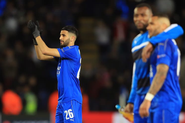 A disappointed Riyad Mahrez applauds the Foxes faithful after valiant effort