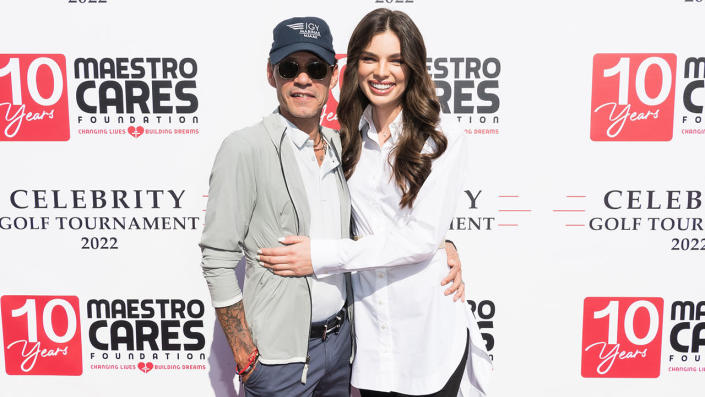 Marc Anthony and Nadia Ferreira attend the 2022 Maestro Cares Foundation's Celebrity Golf Tournament in April. <span class="copyright">Jason Koerner/Getty Images</span>