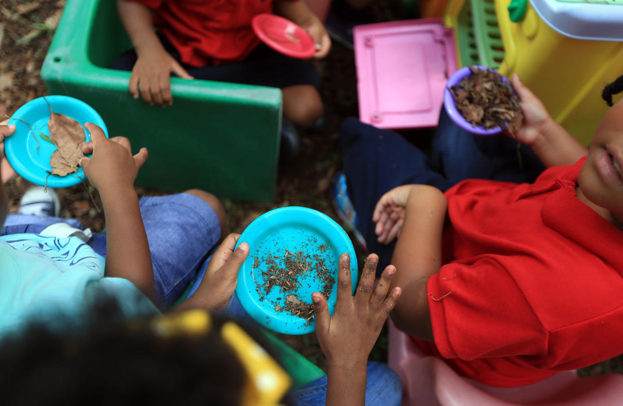 Children often play with dirt, but if the soil is lead-contaminated this can be a hazard to their health. A study in Illinois plans to look at early intervention services for lead-exposed children. (Photo: DANIEL A. ANDERSON FOR HUFFPOST)
