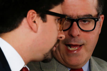 Julio Borges, (R) president of the National Assembly and deputy of the Venezuelan coalition of opposition parties (MUD) talks to Freddy Guevara, first Vice-President of the National Assembly, during a session of Venezuela's opposition-controlled National Assembly to appoint alternative judges to the Supreme Court in Caracas, Venezuela, July 21, 2017. REUTERS/Carlos Garcia Rawlins