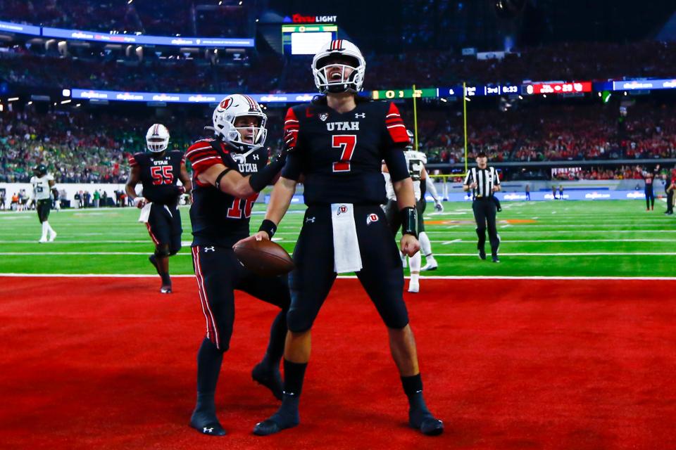 Utah quarterback Cameron Rising (7) celebrates after scoring on a two-point conversion against Oregon during the Pac-12 Championship Game at Allegiant Stadium in Las Vegas on Dec. 3.