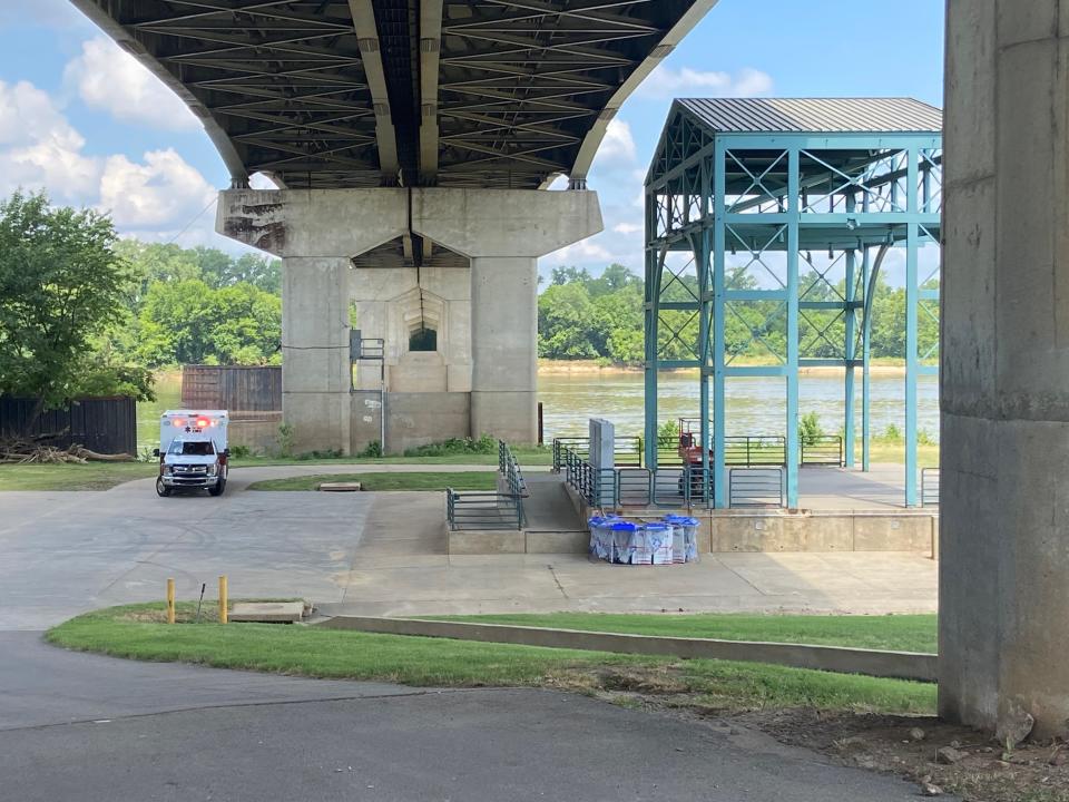 The Fort Smith Fire Department rescues a man, who jumped into the Arkansas River from the Garrison Avenue bridge.