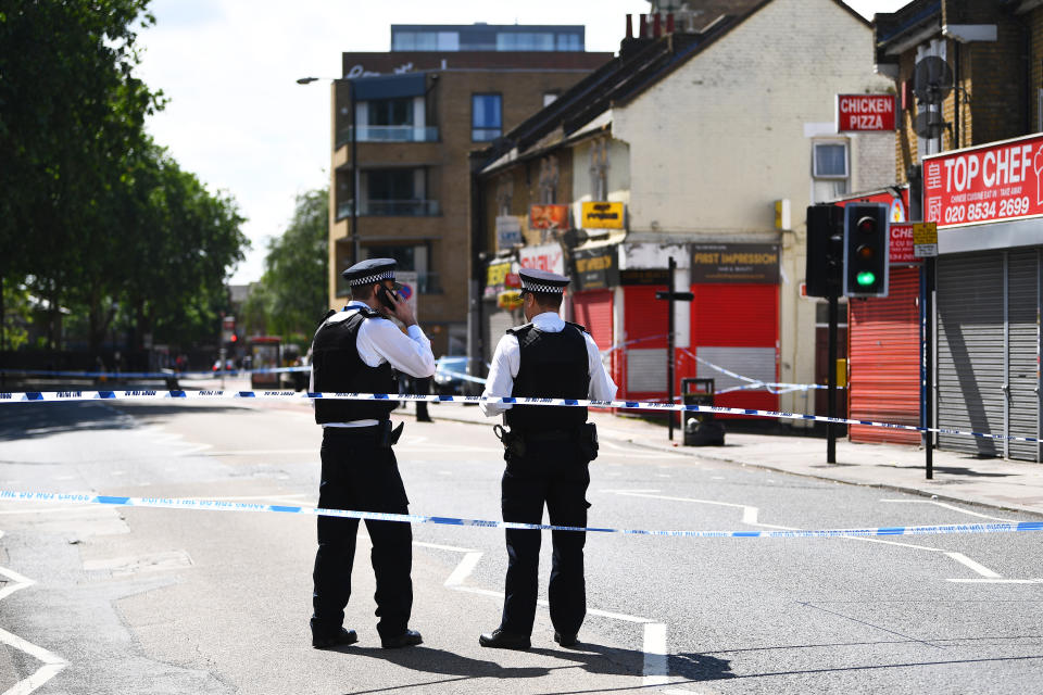 Police chiefs called for the government to invest in new officers after a spate of recent stabbings in London. Pictured: Police attend a stabbing in Stratford, east London. (PA)