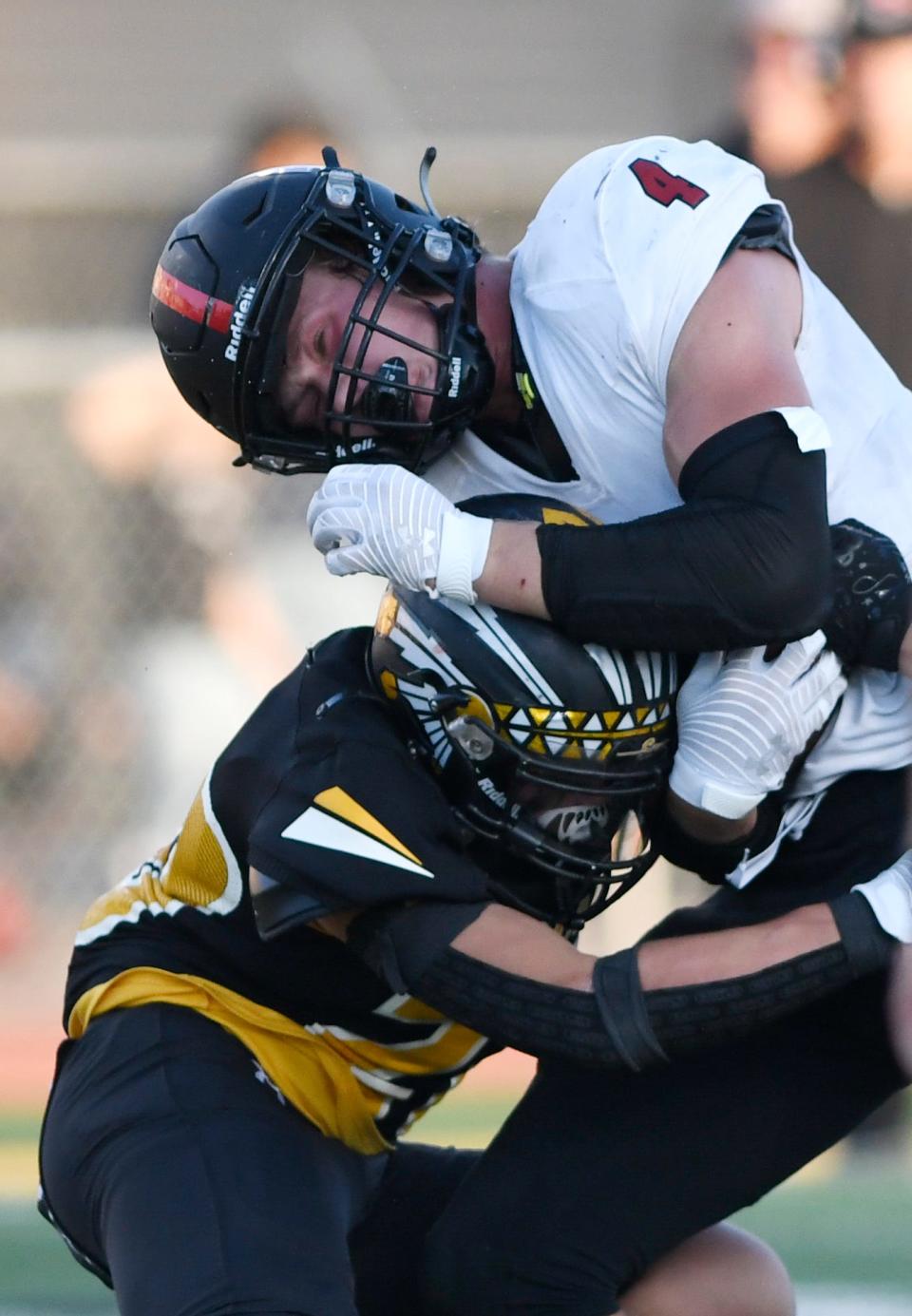 Shallowater's Cannon Reed, right, is tackled by Seminole, Friday, Sept. 2, 2022, at Wigwam Stadium in Seminole. Shallowater won, 40-27.