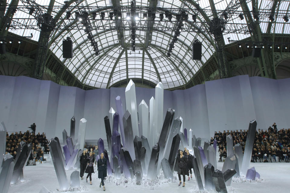 Models wear creations by German Fashion designer Karl Lagerfeld as part of the Chanel presentation for Women's Fall-Winter, ready-to-wear 2013 fashion collection, during Paris Fashion week, Tuesday, March 6, 2012. (AP Photo/Jacques Brinon)