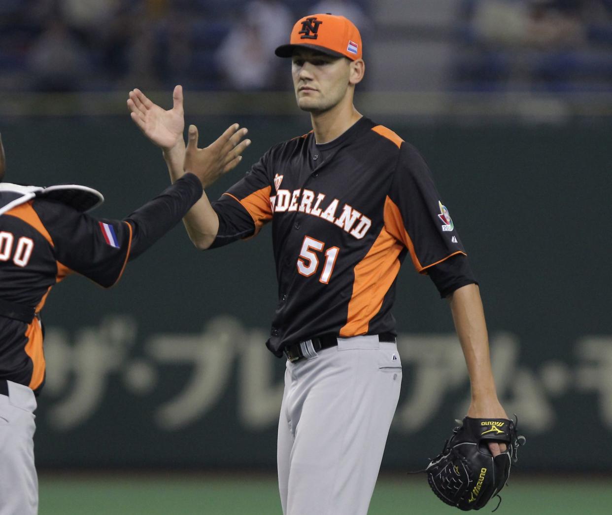 Dutch Pitcher Loek Van Mil # 51 has died in an accident, according to the Royal Dutch Baseball and Softball Association. The organization has not released any details about the accident "at the request of the family." Van Mil was 34 years old.