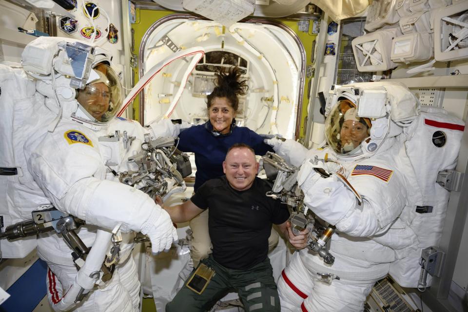 FILE - In this photo provided by NASA, Boeing Crew Flight Test astronauts Suni Williams and Butch Wilmore, center, pose with Expedition 71 Flight Engineers Mike Barratt, left, and Tracy Dyson, aboard the International Space Station's Quest airlock on June 24, 2024. (NASA via AP, File)