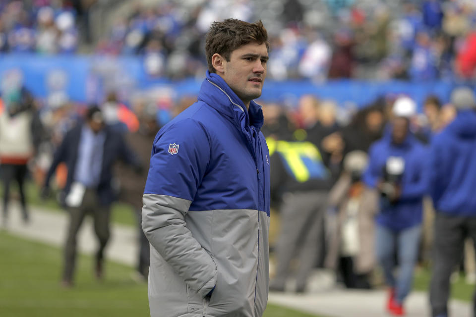 File-This Dec. 15, 2019, file photo shows New York Giants quarterback Daniel Jones walks on the field before an NFL football game against the Miami Dolphins, in East Rutherford, N.J. Jones seemingly is returning as the New York Giants starting quarterback after missing two games with a sprained right ankle. Jones took most of the first-team snaps at practice Wednesday, Dec. 18, 2019, a major indication the rookie will start on Sunday in the penultimate game of the season against the Washington Redskins (3-11) .(AP Photo/Seth Wenig, File)