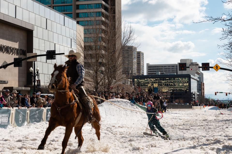 Holland Howe skis behind rider Cole Palfreyman in a skijoring event, part of the Salt Lake Winter Roundup, on West Temple in downtown Salt Lake City on Saturday, Feb. 10, 2024. | Megan Nielsen, Deseret News