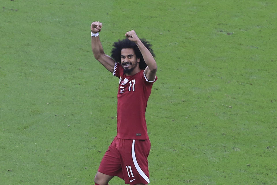 Qatar's Akram Afif celebrates after scoring a goal during the Asian Cup final soccer match between Qatar and Jordan at the Lusail Stadium in Lusail, Qatar, Saturday, Feb. 10, 2024. (AP Photo/Hussein Sayed)