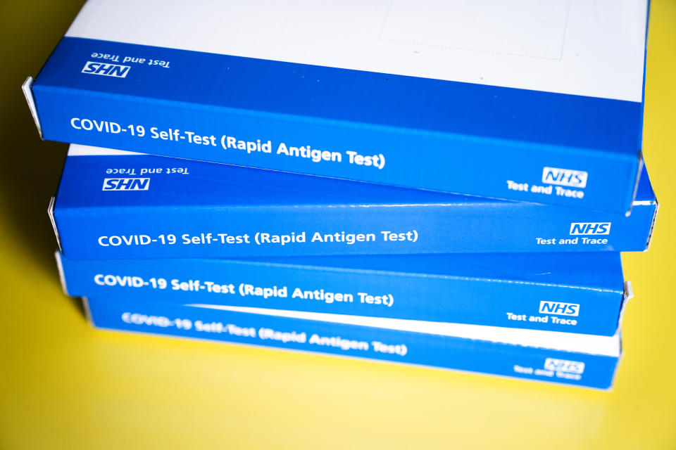 Boxes of NHS Covid-19 rapid antigen test (lateral flow self test) kits. Picture date: Tuesday January 18, 2022.