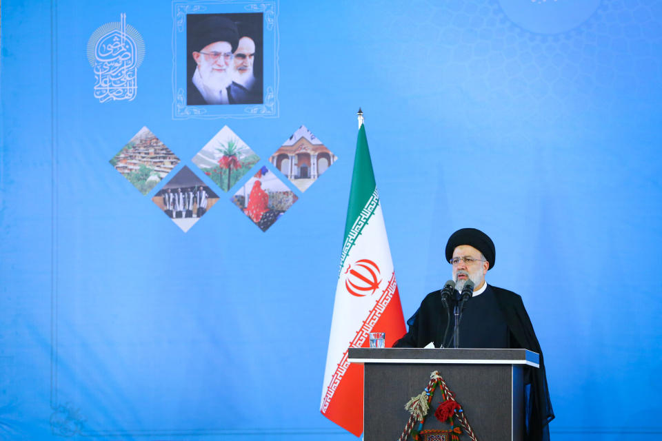 In this photo released by the official website of the office of the Iranian Presidency, President Ebrahim Raisi speaks in a public meeting during a visit to central city of Shar-e Kord, Iran, Thursday, June 9, 2022. A day after the International Atomic Energy Agency's board of governors censured Tehran for failing to provide "credible information" over man-made nuclear material found at three undeclared sites in the country, President Raisi took a firm stance saying Iran will not withdraw from its position. (Iranian Presidency Office via AP)