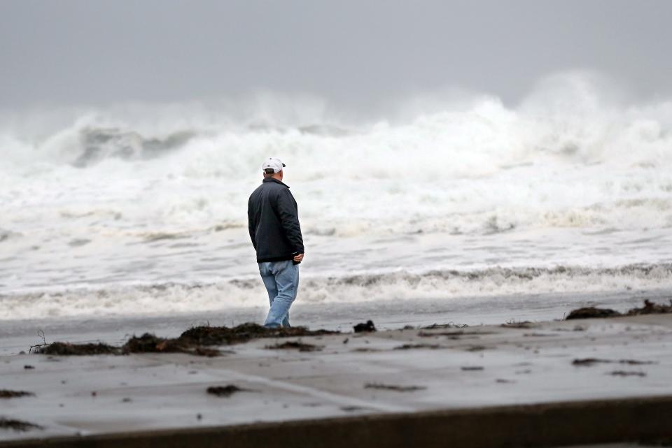 As a winter storm started to settle, people started to explore Short Sands Beach in York and the powerful waves crashing Jan. 17, 2022.