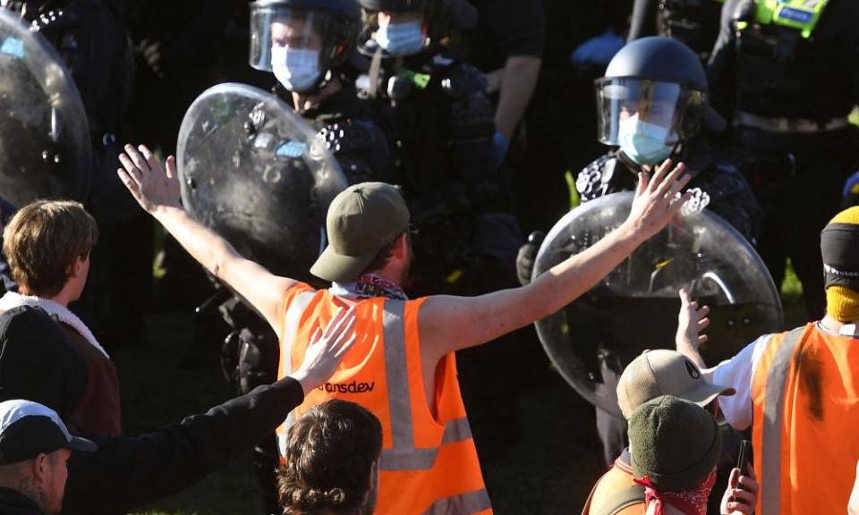 Police confront construction workers and demonstrators on the steps of the Shrine of Remembrance on one day of the violent protests.