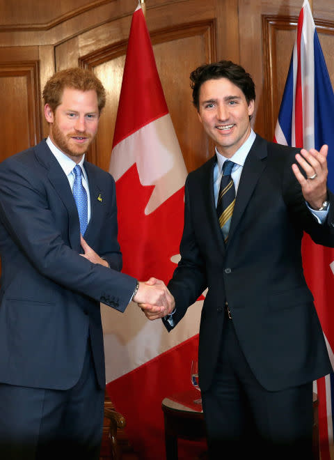 Britain’s Prince Harry and Justin Trudeau (Getty)