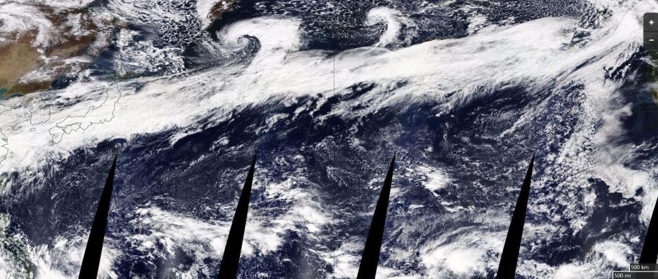 The composite image above, released by NASA, shows a large atmospheric river stretching from China on the left to the coast of North America on the right. (Photo: NASA)