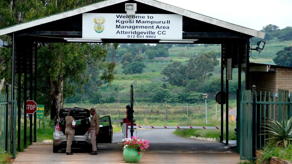Prison officials search a car at the main entrance of the Atteridgeville Prison in Pretoria, South Africa on January 5, 2024. - Themba Hadebe/AP