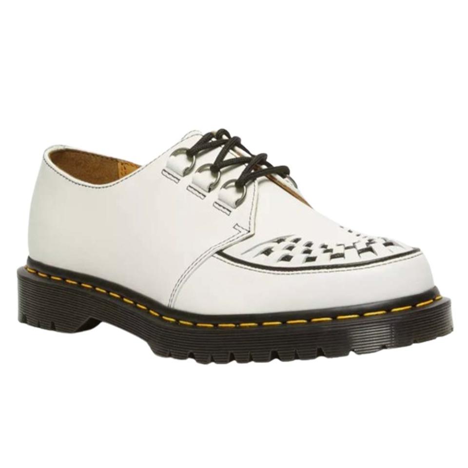 white leather loafer creeper shoe with black woven vamp detailing and rubber sole