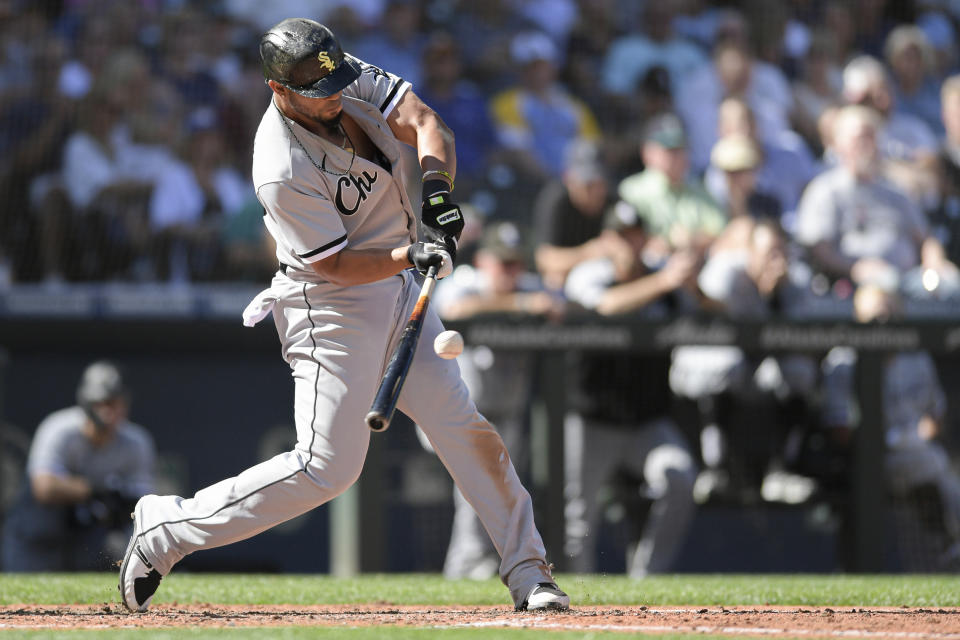 Chicago White Sox's Jose Abreu hits an RBI single against the Seattle Mariners during the sixth inning of a baseball game Wednesday, Sept. 7, 2022, in Seattle. (AP Photo/Caean Couto)