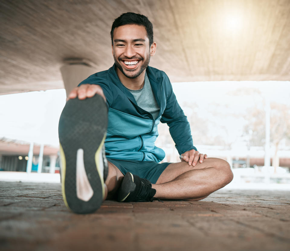 person stretching outside