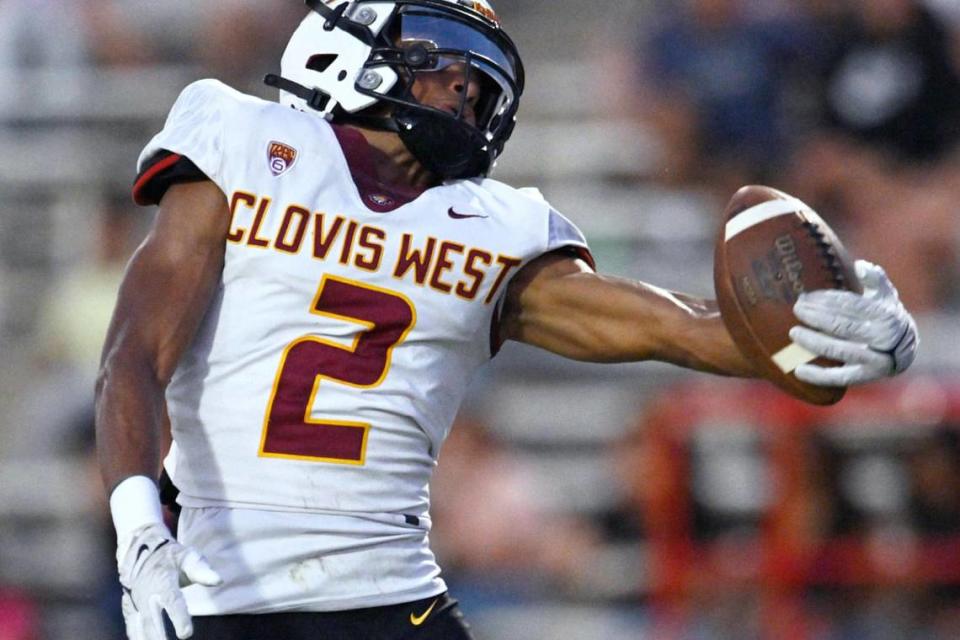 Clovis West’s Jordan Pierro, reaches for the touchdown catch against Edison Friday, Sept. 15, 2023 in Fresno. ERIC PAUL ZAMORA/ezamora@fresnobee.com