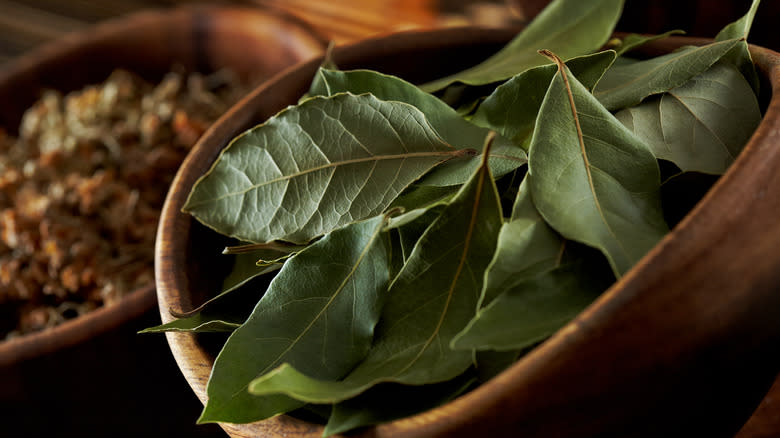 Bay leaves in a wooden bowl